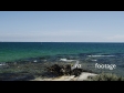 Man sitting on beach 3471